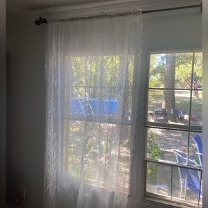 Four panels of white lace scalloped edge curtains each panel is 58 wide 84 long